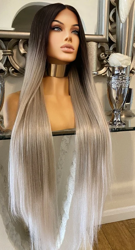 Colored wig with a wavy texture for a beachy and fun lookKim K Dark Root Grey