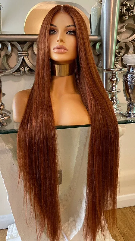 Colored wig with a pre - bleached knot for a natural - looking scalpKim K - Burnt orange