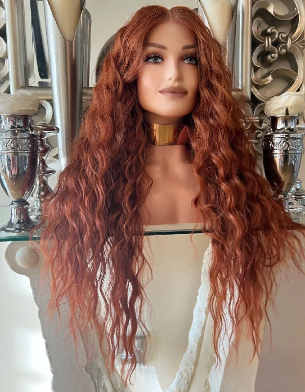 Colored wig with a wispy fringe for a soft and feminine lookBeyoncé Burnt Orange wave