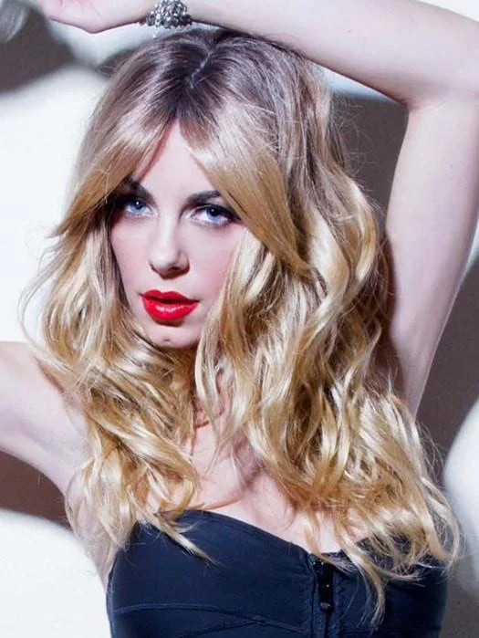 Long - length wig with a wavy texture for a beachy and romantic lookHollywood Honey by Forever Young