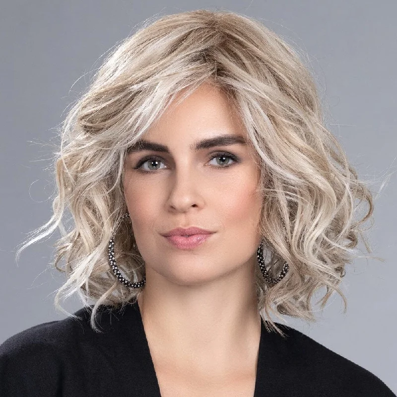 Long - length wig with a curly fringe for a playful and youthful vibeLovely Heat Friendly Topper by Ellen Wille