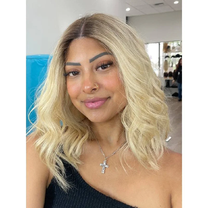 Short wig with auburn highlights for a warm and rich color16" Divine Lace Top Wig Platinum Blonde w/ Partial Rooting