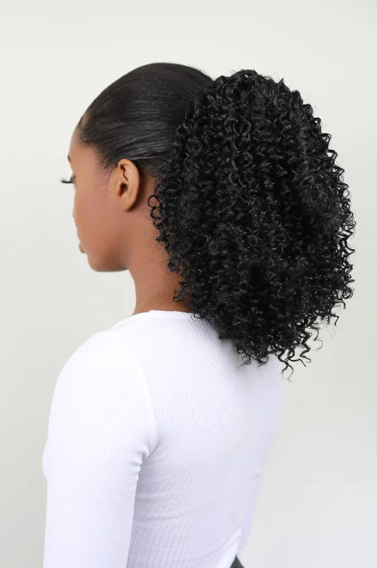 Curly ponytails with tight ringlets for a playful and feminine vibeAisha: Heat Resistant Synthetic Fibre Kinky Ponytail