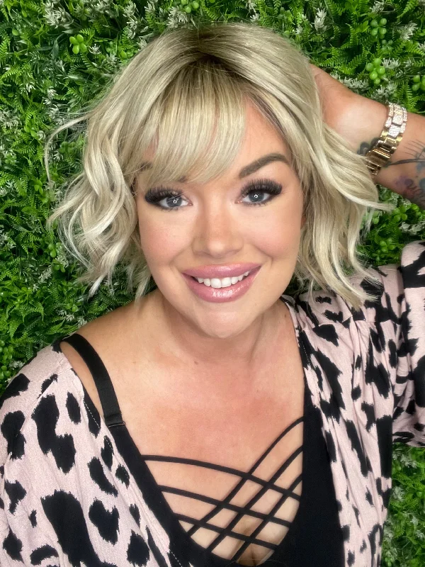 Short wig with a wavy texture for a beachy and relaxed lookCleo Sunflower Blonde HS Standard Luxury Wig CA1 W6217