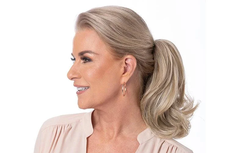 Blonde - colored ponytails for a sun - kissed and trendy lookLayered Flip Pony Hairpiece by Toni Brattin | Heat Friendly Synthetic Ponytail (Clip-In)