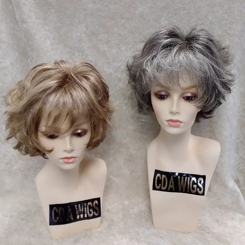 Medium - length wig with a curly fringe for a playful and youthful vibeBARB