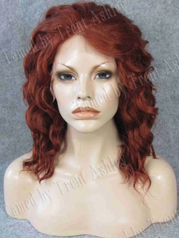 Medium - length wig with a curly fringe for a playful and youthful vibeCARRIE AURORA