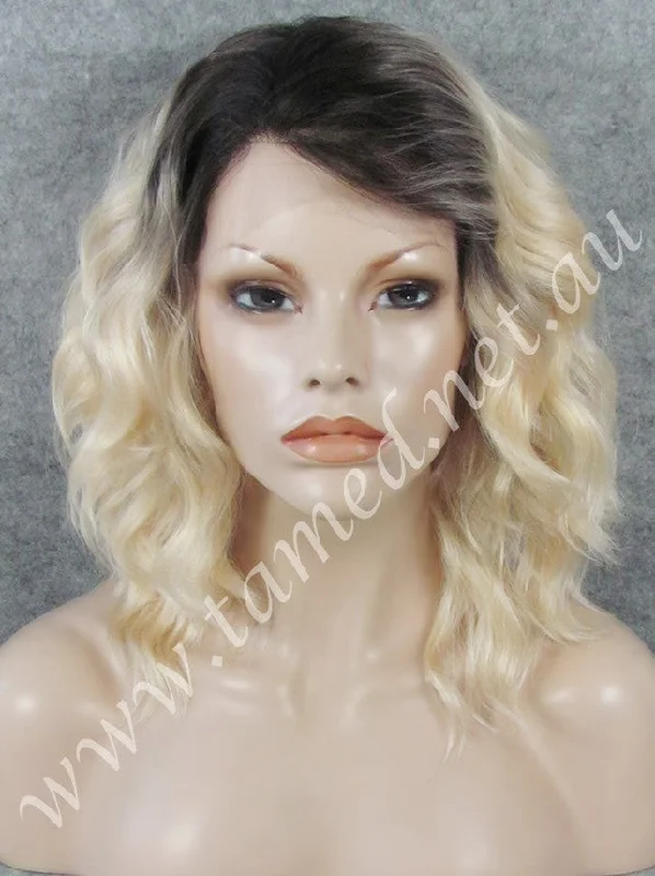 Medium - length wig with a wispy fringe for a soft and feminine lookCARRIE HONEYSUCKLE