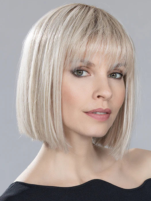 Medium - length wig with a straight texture for a sleek and modern lookCleo | Heat Friendly Synthetic (Mono Crown) Wig by Ellen Wille