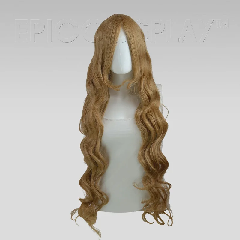 Long - length wig with a wavy texture for a beachy and romantic lookHera - Ash Blonde Wig