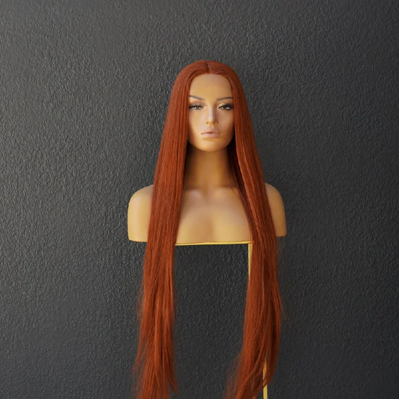 Long - length wig with a wavy texture for a beachy and romantic lookISABELLE AUBURN Lace Front Wig