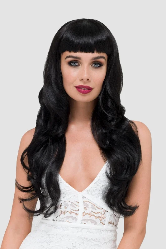 Long - length wig with a wispy fringe for a soft and feminine lookLong wavy black wig with vintage-style, rockabilly, straight fringe: Eloise