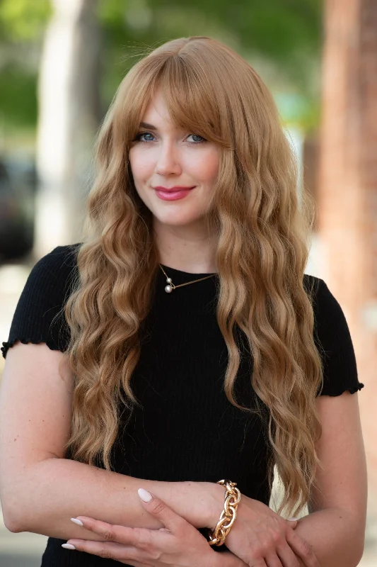 Medium - length wig with a curly fringe for a playful and youthful vibeStrawberry Blonde Wavy Synthetic Wig with Bangs Amelie