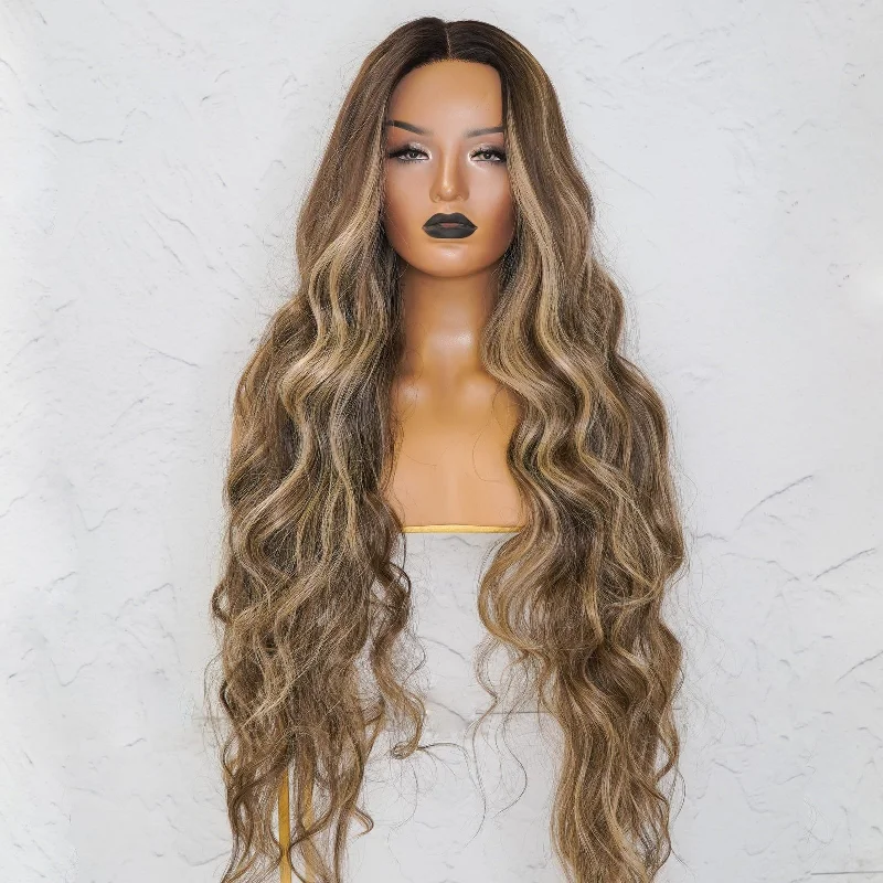 Long - length wig with a 220 - density for an extra - full appearanceZENDAYA Latte Lace Front Wig